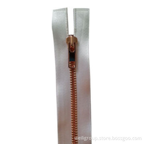 Metal zipper with satin ribbon